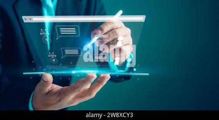 Businessman uses tablet to type chat Ask and answer with the artificial intelligence system, chatbot, AI assistant. Stock Photo