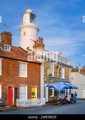 People enjoy a summers evening drink at The Sole Bay Inn in Southwold, Suffolk, England. Stock Photo