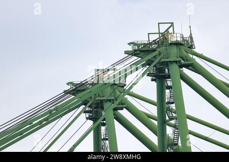Structure of Big crane in an industrial port. Stock Photo