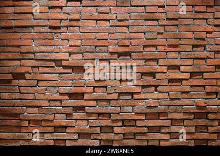 red shiny brick wall, wide panorama of masonry, bricklaying. Stock Photo