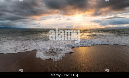 An Ocean Seascape With Golden Sun Rays Breaking Through The Clouds 16:9 High Resolution Stock Photo