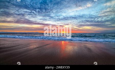 An Ocean Seascape With Golden Sun Rays Breaking Through The Clouds 16:9 High Resolution Stock Photo