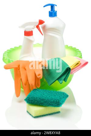 Green washbasin with cleaning products Stock Photo