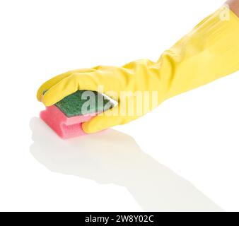 Hand in yellow glove with pink sponge Stock Photo