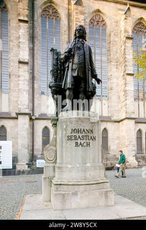 The New Bach Monument in Leipzig is located in St Thomas' Churchyard to the south of St Thomas' Church in place of the Leibniz Monument, which stood Stock Photo