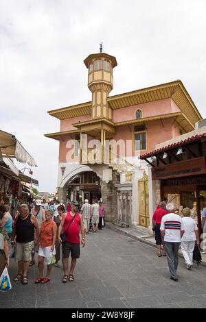 Rhodes Island, Rhodes is a town on the northern tip of the Greek island of the same name, Rhodes. Turkish house. Tourists in the old town centre Stock Photo