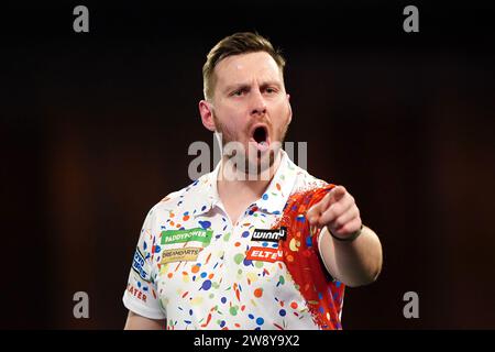 Florian Hempel reacts during his match against Dimitri Van den Bergh (not pictured) on day eight of the Paddy Power World Darts Championship at Alexandra Palace, London. Picture date: Friday December 22, 2023. Stock Photo