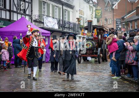 Lymm Dickensian Day 2023. People dressed in Dickensian costume; stalls in the streets; street entertainment; The Grand Parade begins Stock Photo