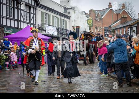 Lymm Dickensian Day 2023. People dressed in Dickensian costume; stalls in the streets; street entertainment; The Grand Parade begins Stock Photo