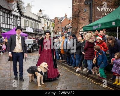 Lymm Dickensian Day 2023. People dressed in Dickensian costume; stalls in the streets; street entertainment; Grand Parade Stock Photo