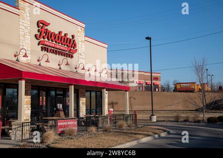 Lansing, Kansas.  Fast food strip showing Freddy's frozen custard and steakburgers, Arby's roast beef and Popeyes chicken. Stock Photo