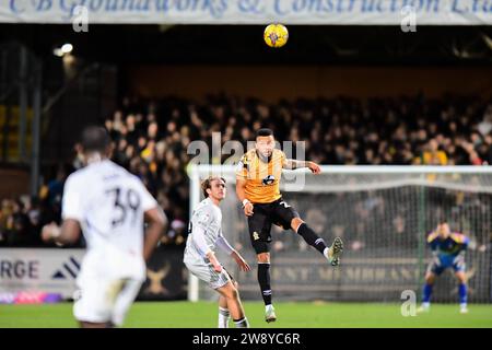 Jordan Cousins (24 Cambridge United) heads the ball during the Sky Bet League 1 match between Cambridge United and Exeter City at the R Costings Abbey Stadium, Cambridge on Friday 22nd December 2023. (Photo: Kevin Hodgson | MI News) Credit: MI News & Sport /Alamy Live News Stock Photo