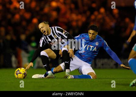 Stockport County's Kyle Knoyle tackles Notts County's Jodi Jones during the Sky Bet League Two match at Edgeley Park, Stockport. Picture date: Friday December 22, 2023. Stock Photo