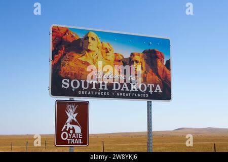 Highway, South Dakota, USA - September 30 2023: Welcome to South Dakota road sign. Great faces, great places. Travel concept. Stock Photo