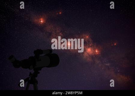 Astronomy. Viewing beautiful starry sky through telescope at night Stock Photo