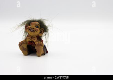 Funny ugly dirty troll toy Stock Photo - Alamy