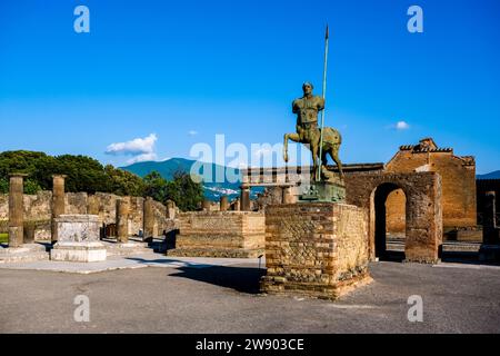 Ruins of the Forum and Centaur Statue, Statua di centauro in the archaeological site of Pompeii, an ancient city destroyed by the eruption of Mount Ve Stock Photo