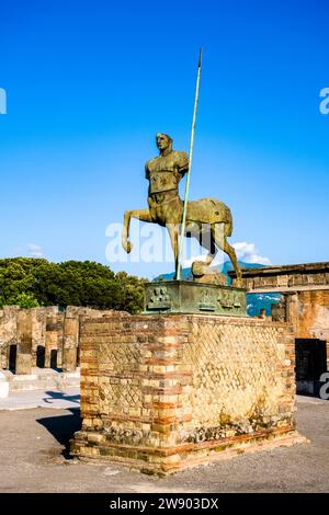 Ruins of the Forum and Centaur Statue, Statua di centauro in the archaeological site of Pompeii, an ancient city destroyed by the eruption of Mount Ve Stock Photo