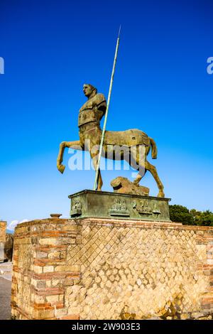 Ruins of the Forum and Centaur Statue, Statua di centauro in the archaeological site of Pompeii, an ancient city destroyed by the eruption of Mount Ve Stock Photo