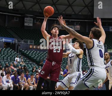 Honolulu, Hawaii, USA. 22nd Dec, 2023. Massachusetts forward Josh Cohen (23) shoots the ball during the Hawaiian Airlines Diamond Head Classic basketball game between the Massachusetts Minutemen and Portland Pilots at Sofi Arena in the Stan Sheriff Center in Honolulu, Hawaii. Glenn Yoza/CSM/Alamy Live News Stock Photo