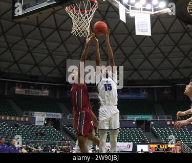 Honolulu, Hawaii, USA. 22nd Dec, 2023. Portland guard Tyler Harris (15) grabs the rebound during the Hawaiian Airlines Diamond Head Classic basketball game between the Massachusetts Minutemen and Portland Pilots at Sofi Arena in the Stan Sheriff Center in Honolulu, Hawaii. Glenn Yoza/CSM/Alamy Live News Stock Photo