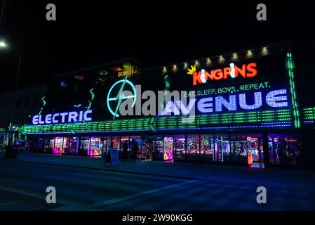 Southend on Sea seafront lights and amusement arcade at night. Electric Avenue amusements with bowling alley, on Marine Parade Stock Photo