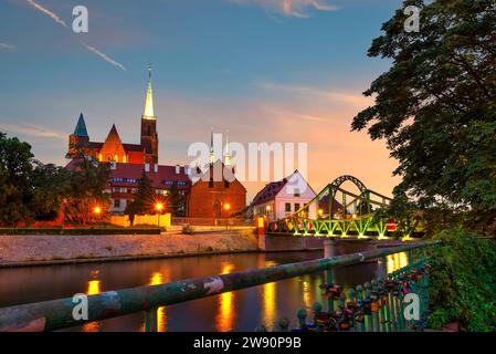 Sunrise sky over old cathedral and Tumski bridge in Wroclaw, Poland Stock Photo