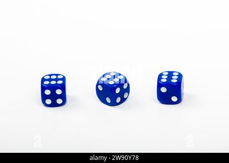 Set of Three Blue Dice with Six Points Up on White Background - Perfect for Board Games and Casino Nights Stock Photo