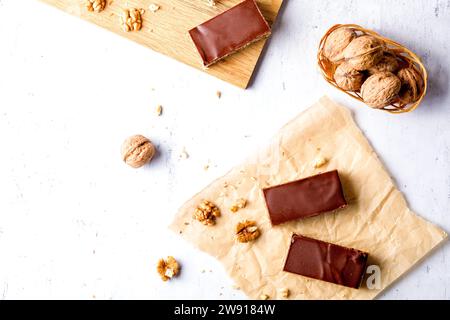Gerbeaud Cake. Zserbo. Traditional Hungarian multi-layer cake with plum jam, nuts and covered with chocolate glaze Stock Photo