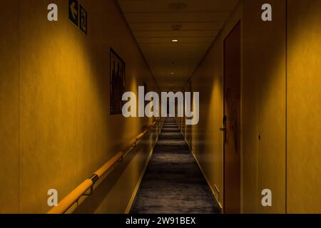 Dark Hallway in a hotel inside a big ferry ship Stock Photo