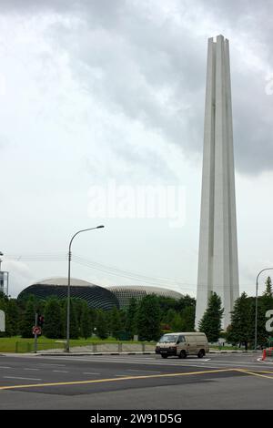 Central Area, Singapore - August 22 2007: The obelisk named Civilian War Memorial was shaped like a huge chopsticks. It is located at War Memorial Par Stock Photo