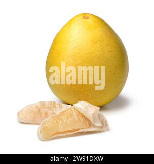 Whole fresh yellow Pomelo and peeled pomelo slices close up isolated on white background Stock Photo