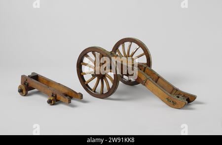 Model of a Carriage for a 4-Pounder Gun, Jochem Pietersz. Asmus (possibly), 1800 demonstration model Model of a canon for a cannon of 4 pounds for use on land and on a ship; The course itself is missing, as well as some attributes. The central body consists of two cheeks connected by a long sole plate and a calf. The Stelwig runs in a groove in the sole plate, where it cannot be eliminated; At the bottom of the wedge, a hug is mounted so that the wedge is moved forward and backwards with a crank with a screw-without-end. In the composition of Veldaffuit, the cheeks are extended to the rear wit Stock Photo