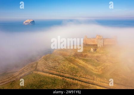 UK, Scotland, North Berwick, Aerial view of Tantallon Castle shrouded in morning fog Stock Photo