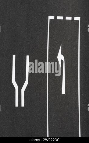 Left turn road marking on asphalt road Stock Photo