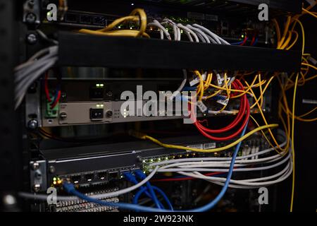 Cables and wires connected with supercomputer equipment in server room Stock Photo