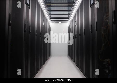 Aisle between rack cabinets in server room Stock Photo