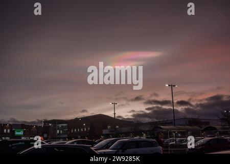 Didcot, England, Saturday 23rd December 2023, Rare Polar stratospheric clouds (PSCs) also known as nacreous clouds appear in the sky dramatically over Didcot Orchard Centre. Credit: Lu Parrott/ Alamy Live News Stock Photo