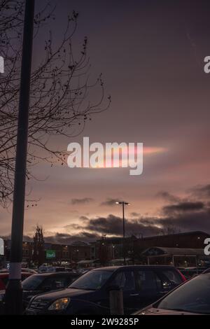 Didcot, England, Saturday 23rd December 2023, Rare Polar stratospheric clouds (PSCs) also known as nacreous clouds appear in the sky dramatically over Didcot Orchard Centre. Credit: Lu Parrott/ Alamy Live News Stock Photo