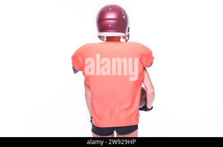 Woman in the uniform of an American football team player posing in the studio. White background. Back view. Sports concept. Mixed media Stock Photo