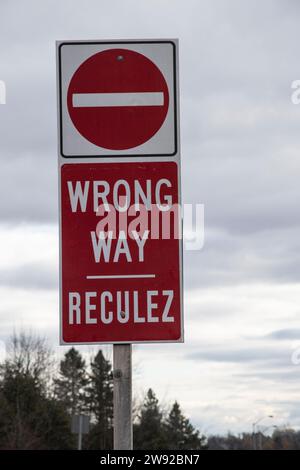 Wrong way traffic sign at the Ontario tourist information centre in Hawkesbury, Ontario, Canada Stock Photo