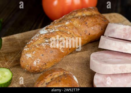 soft fresh bread with the addition of various grains and cereals, close-up of soft multi-grain bread Stock Photo