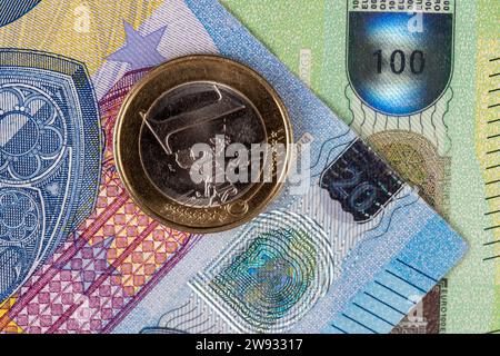 American dollars and European euros close-up, different convertible currencies of euros and dollars together Stock Photo