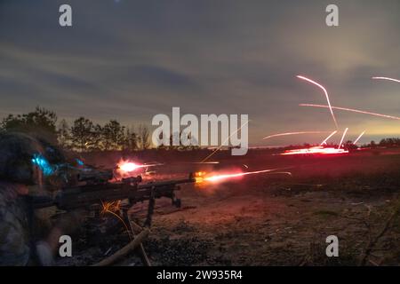 A Ranger fire team assigned to the 75th Ranger Regiment suppresses ...