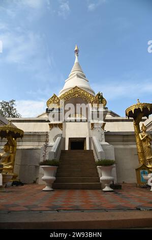 White Pagoda located on the top of the mountain Inside Wat Phra That Pha Ngao temple. Located at Chiang Rai Province in Thailand. Stock Photo