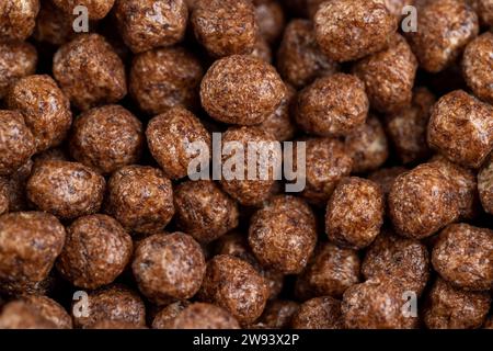 dry chocolate balls sweet and healthy breakfast before cooking, used to make a quick breakfast with milk chocolate flakes Stock Photo