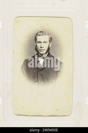 Studio portrait of a man with large sideburns and a bow tie, c. 1863 - c. 1866 visit card  Amsterdam paper. cardboard albumen print Stock Photo