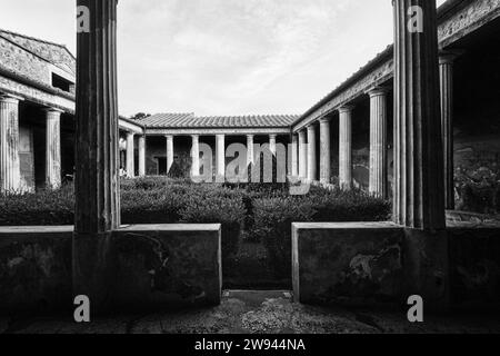 Naples, Italy - November 8 2023: Courtyard garden in a typical Roman villa of the ancient Pompeii Stock Photo