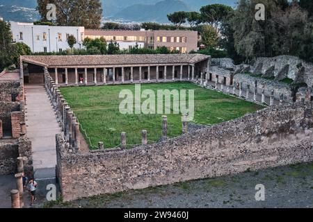 Naples, Italy - November 8 2023: Archaeological Park of Pompeii. Quadriporticus of the theaters or gladiator barracks Stock Photo