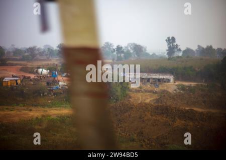 A bridge being built on a River in the interiors of India. This is a site for the construction of the Bridge where you can see cement trucks in work. Stock Photo